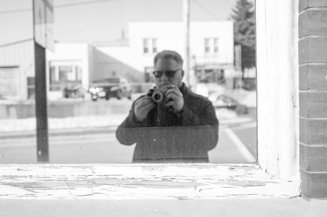Portrait of a Latin American male street photographer